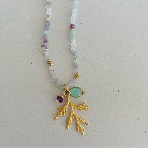 Delicate Gold Leaf Pendant Necklace with Aquamarine colored and Purple Beads